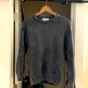 Distressed sweater